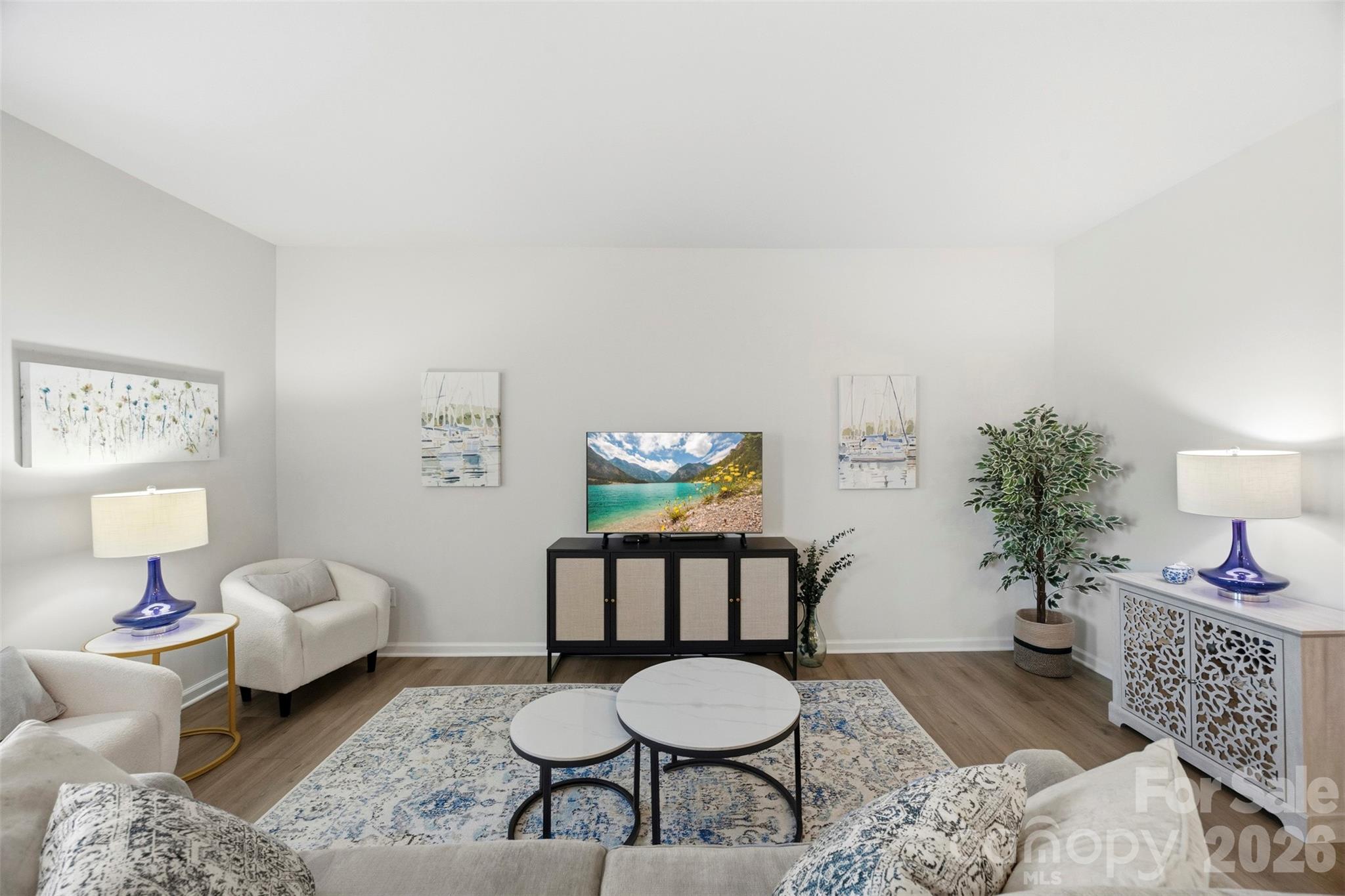 5030 Moss Pne Way Fort Mill, SC 29708 - Photo 15 of 28 a living room with furniture and wooden floor