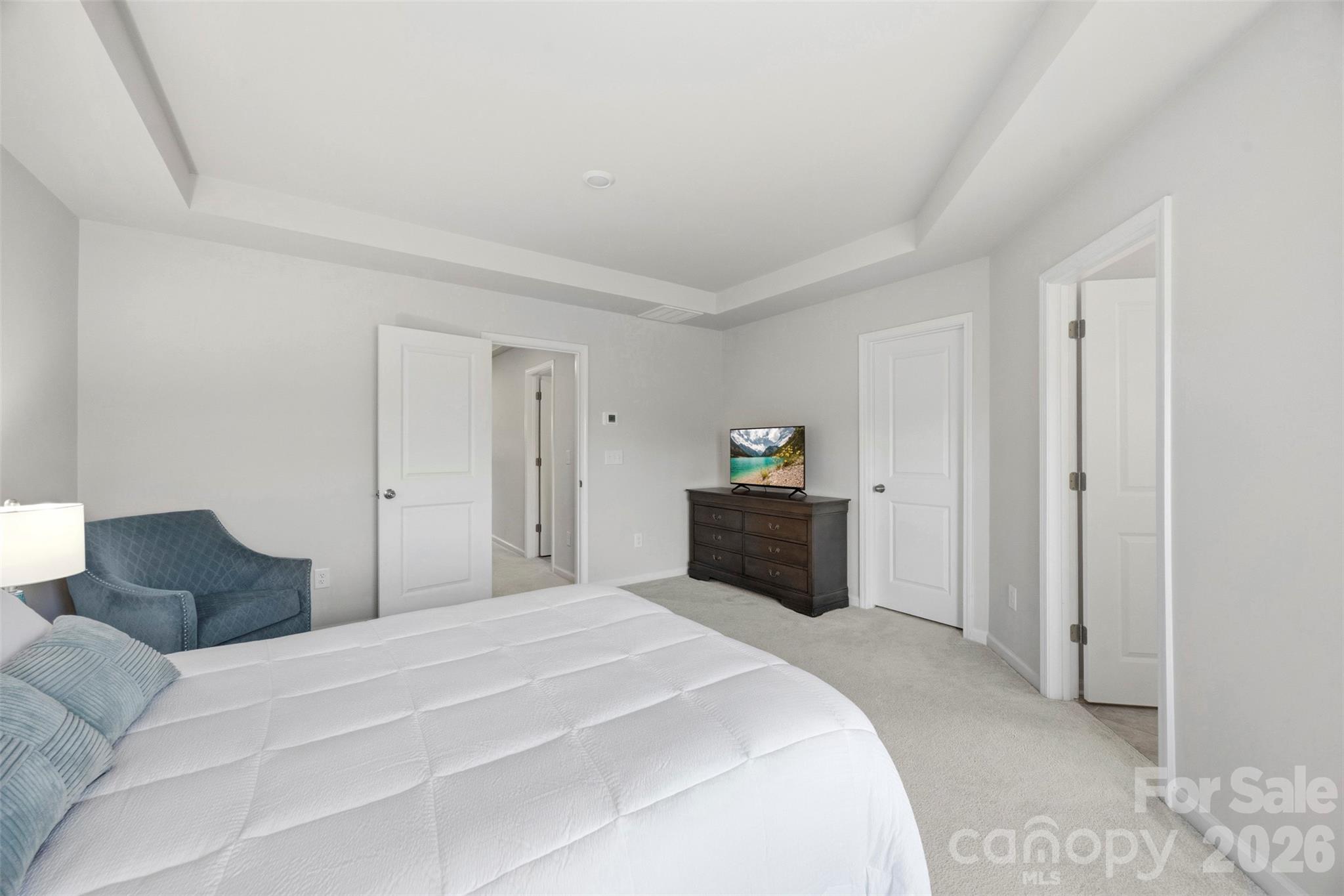 5030 Moss Pne Way Fort Mill, SC 29708 - Photo 19 of 28 a bedroom with a bed and a view of bathroom