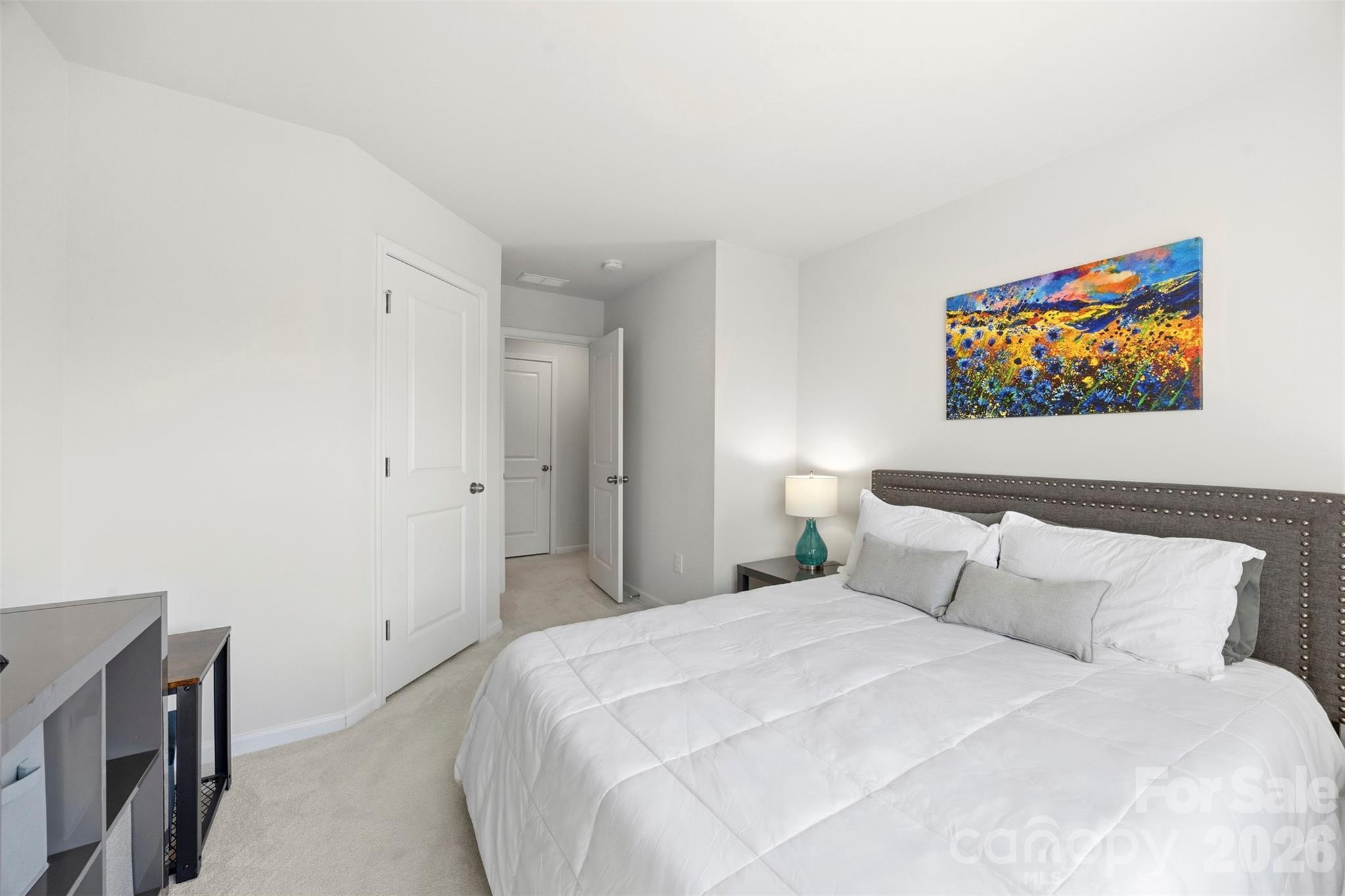 5030 Moss Pne Way Fort Mill, SC 29708 - Photo 22 of 28 a bedroom with a bed and a painting on the wall