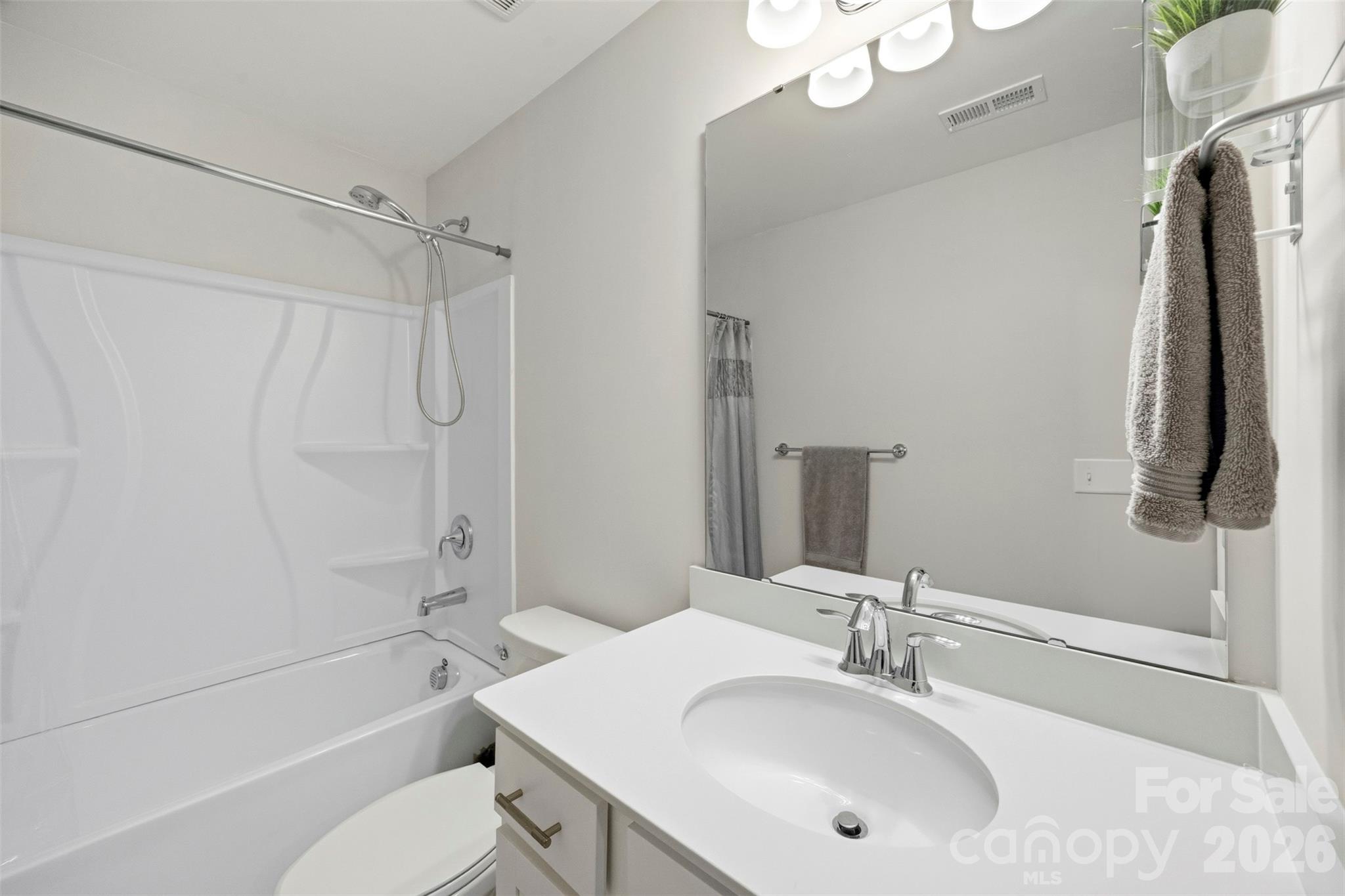 5030 Moss Pne Way Fort Mill, SC 29708 - Photo 23 of 28 a bathroom with a sink a toilet and shower