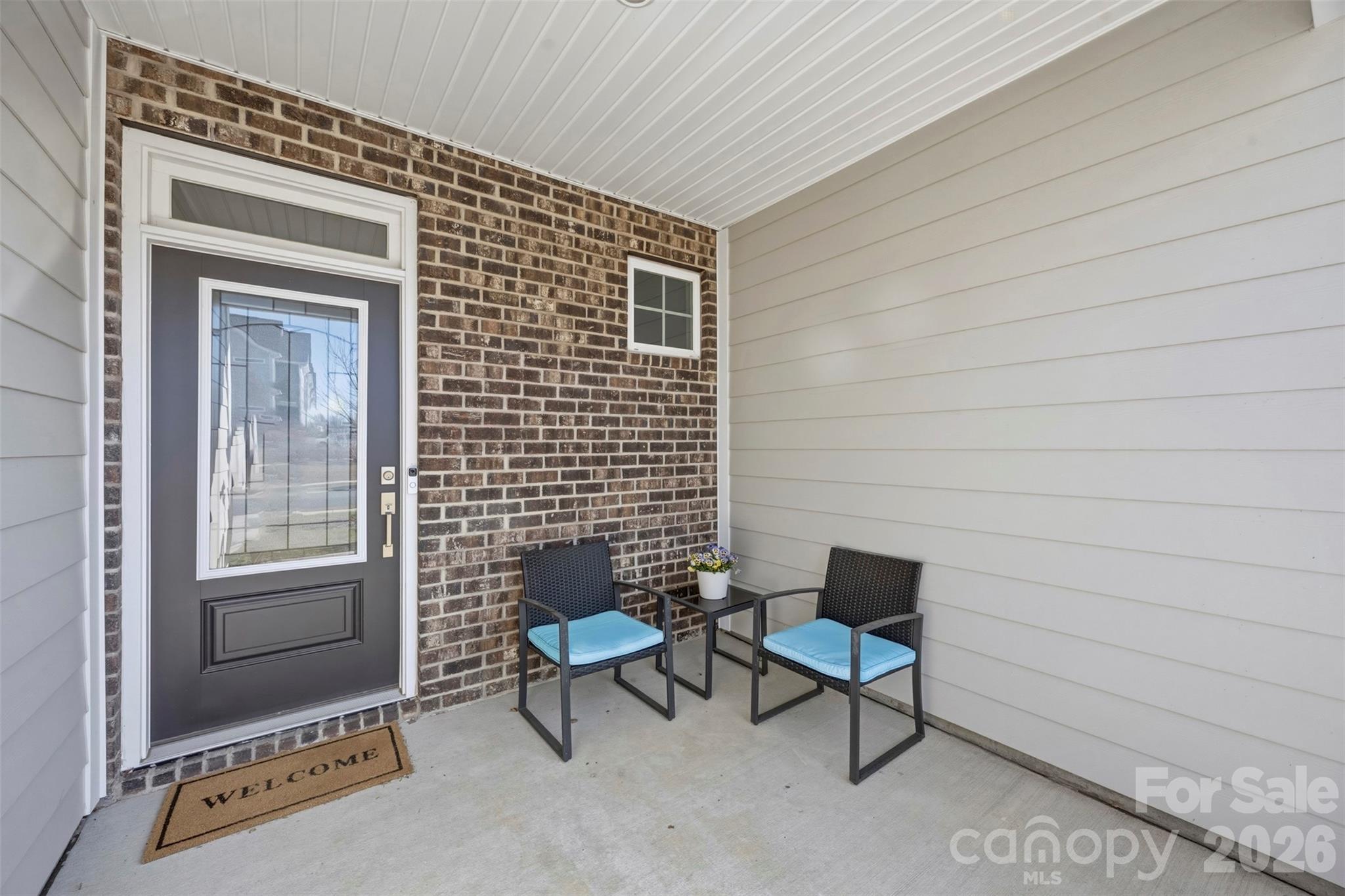5030 Moss Pne Way Fort Mill, SC 29708 - Photo 6 of 28 a outdoor living space with furniture and a window