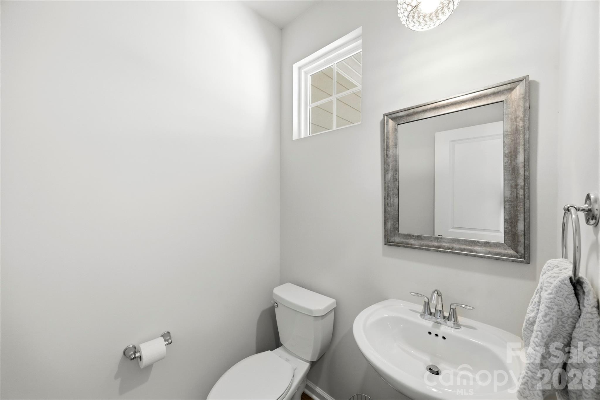 5030 Moss Pne Way Fort Mill, SC 29708 - Photo 8 of 28 a bathroom with a toilet sink and mirror