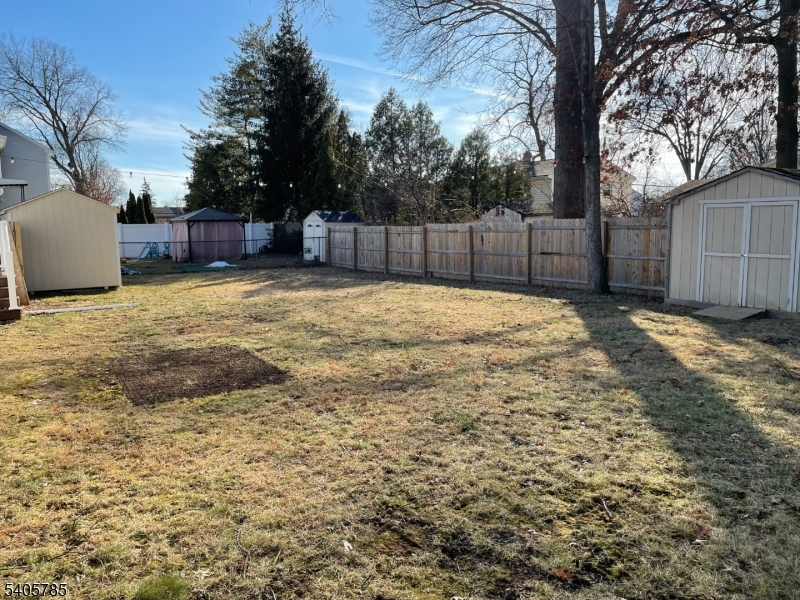 31 Kingston Road Parsippany, NJ 07054 - Photo 15 of 15 a backyard of a house with lots of green space