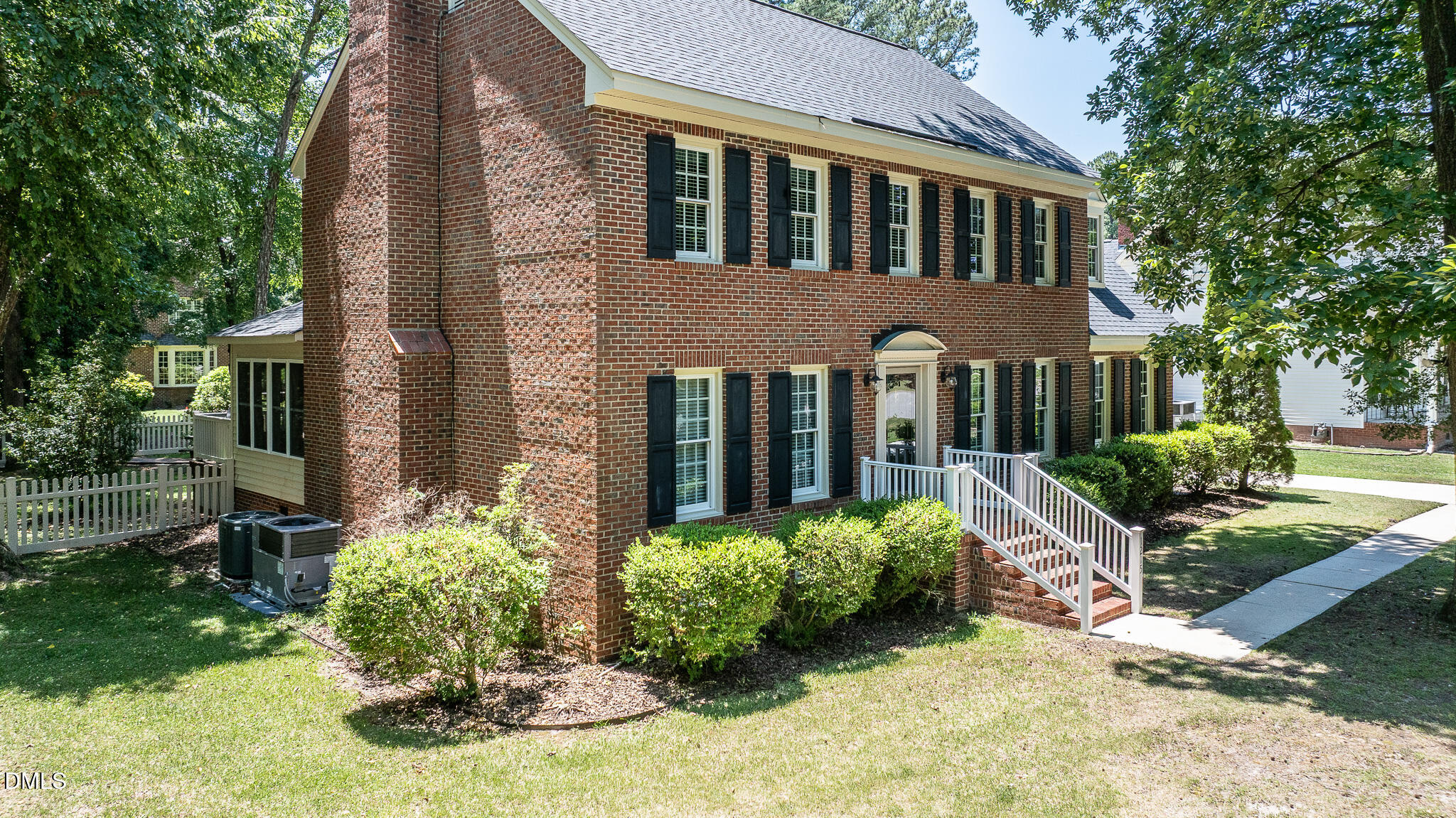 1215 Cambridge Road Northwest Wilson, NC 27896 - Photo 20 of 54 a front view of a house with garden