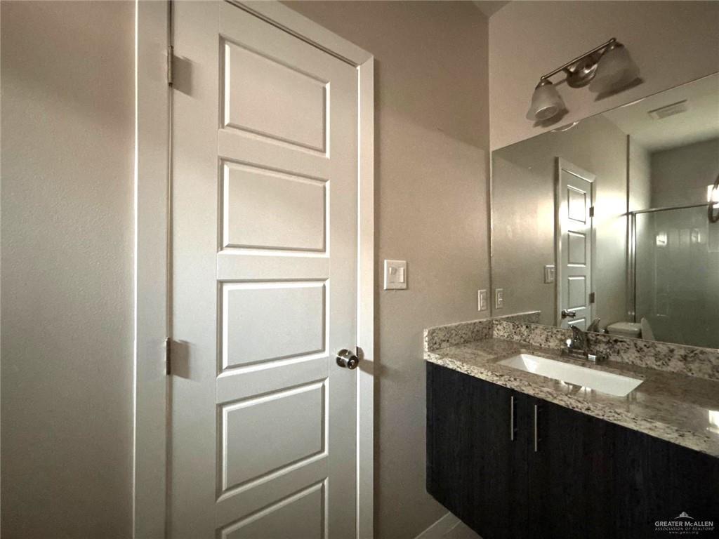 1405 Alta Vista Drive, Unit 4 Weslaco, TX 78596 - Photo 10 of 15 Bathroom featuring vanity
