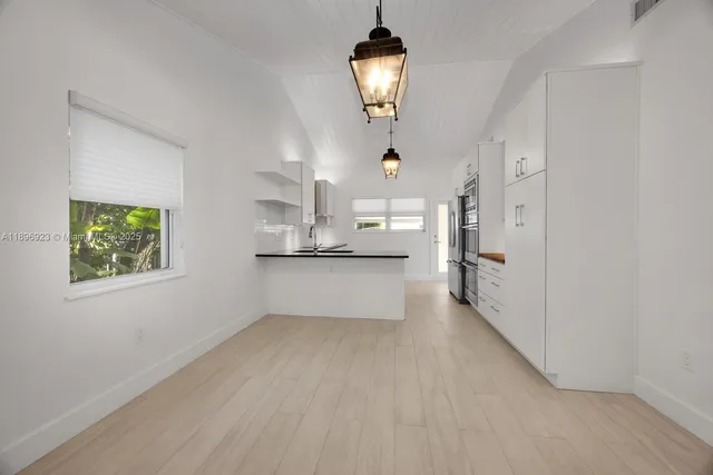 an empty room that has a window