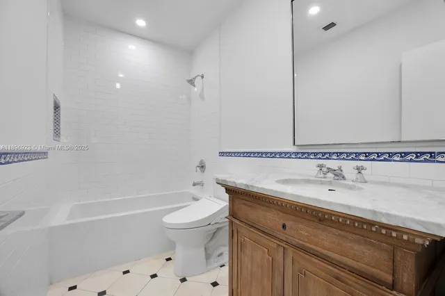 a view of a hallway with washer and dryer