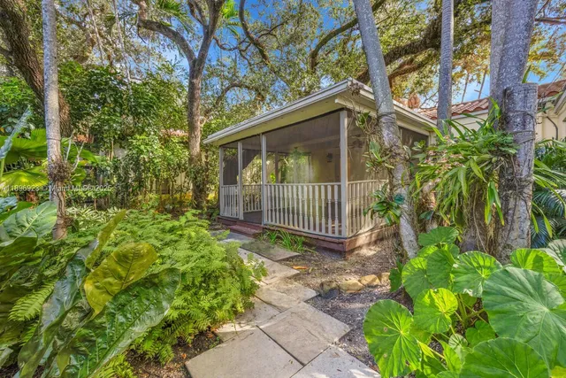 a view of a porch with wooden floor