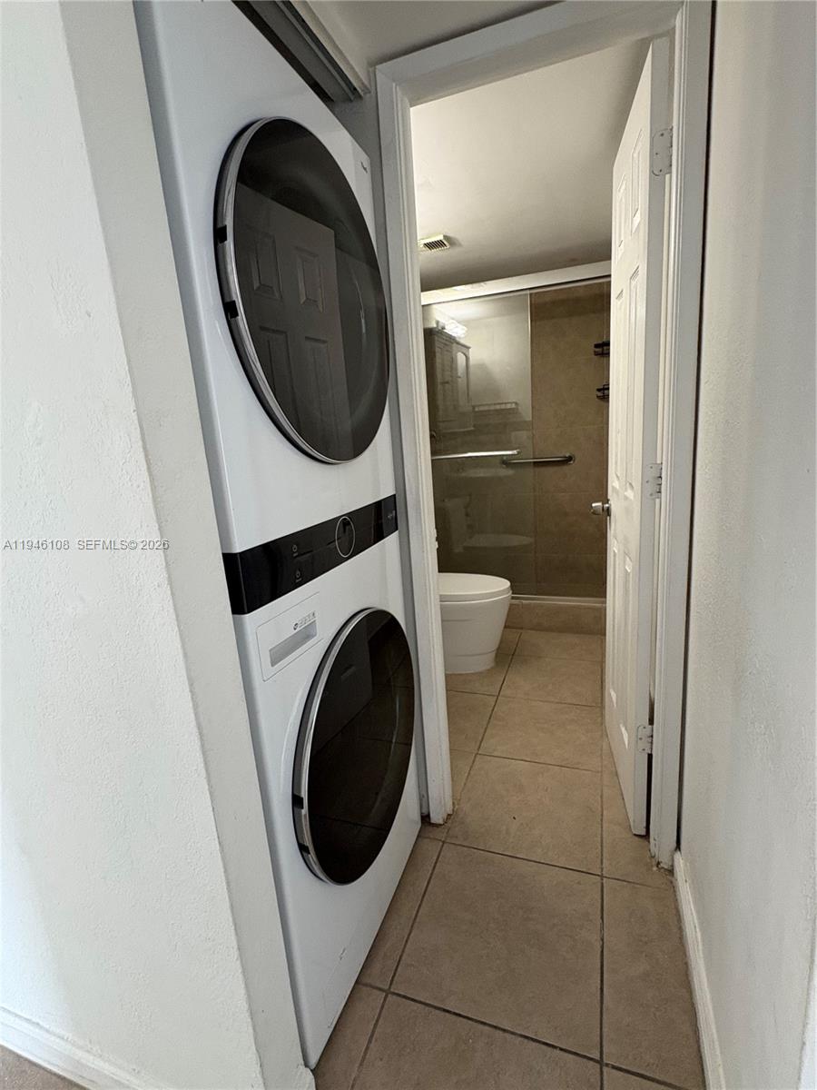 600 Northeast 36th Street, Unit 714 Miami, FL 33137 - Photo 7 of 10 a utility room with dryer and washer