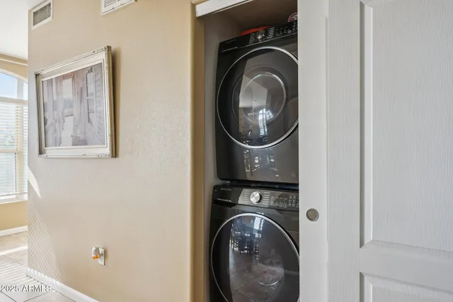 a utility room with dryer and washer
