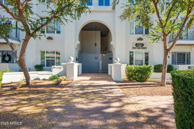 a picture of a bathroom with a shower