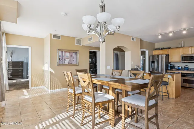 a view of a dining room with furniture