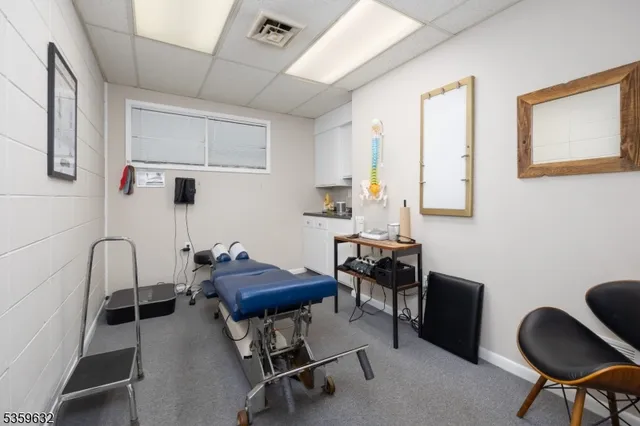 a workspace with furniture and a window