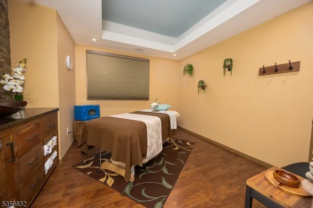 a bedroom with a bed and furniture