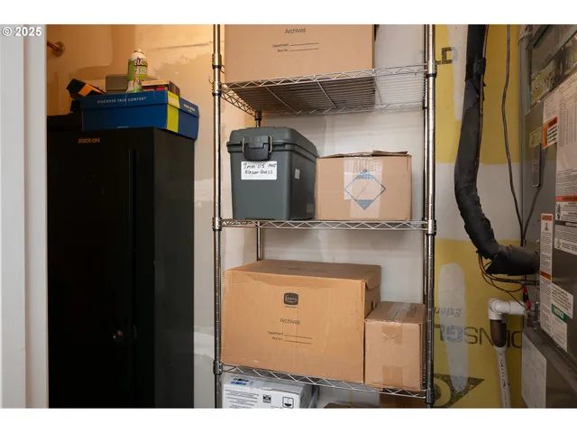 a balcony with table and chairs