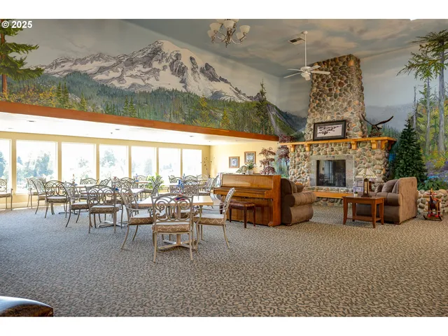a building outdoor space with patio furniture and potted plants