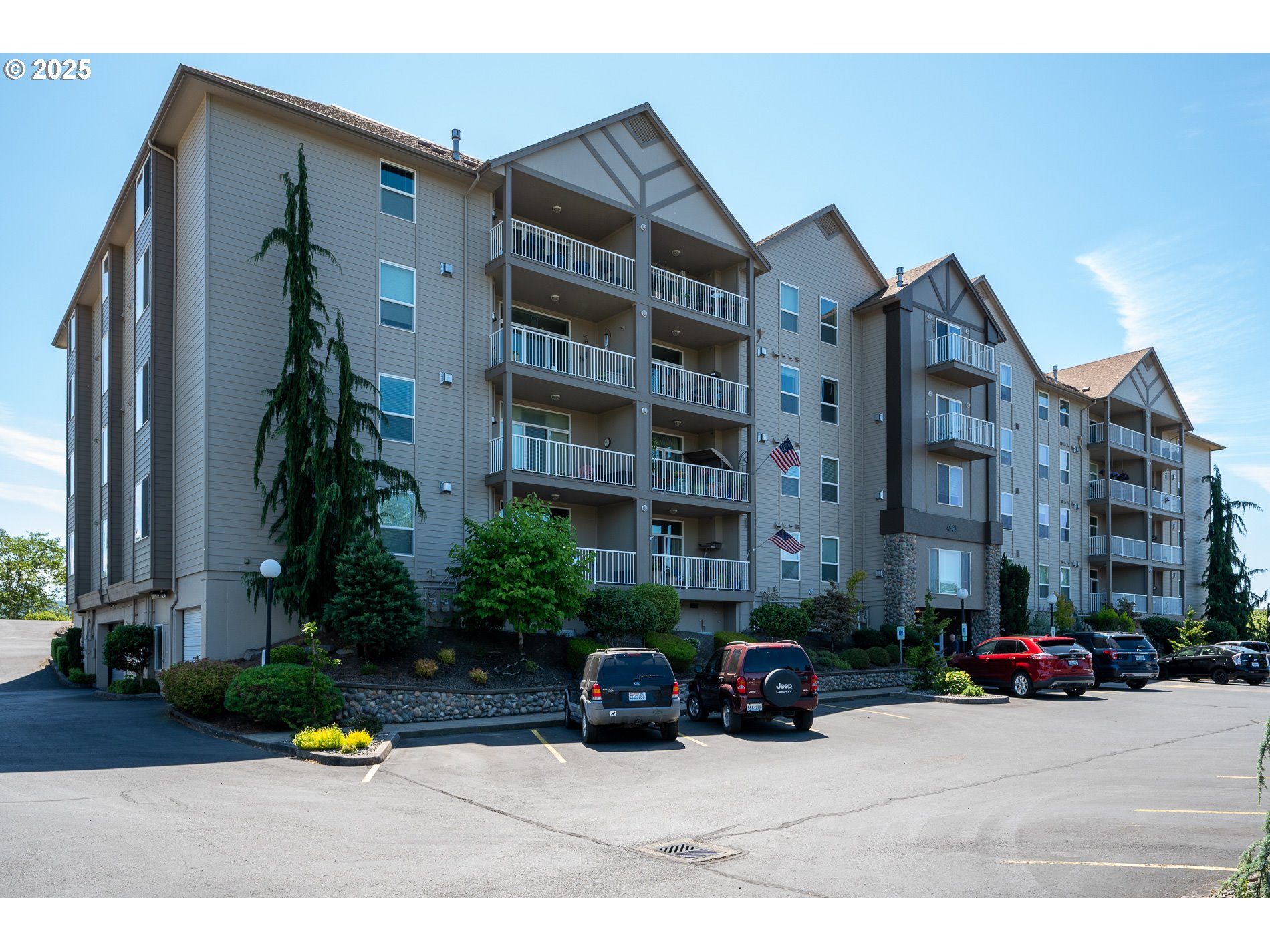 1548 River Road, Unit 401 Longview, WA 98632 - Photo 23 of 34 a view of street with parked cars