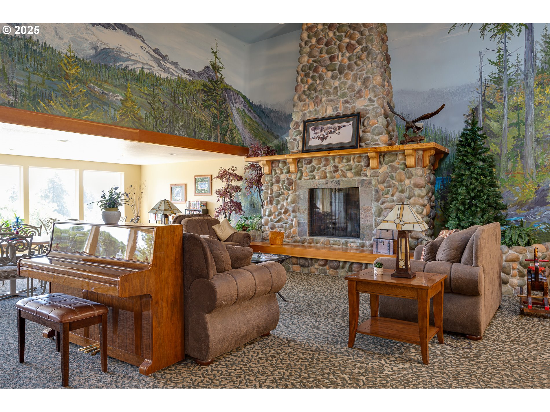 1548 River Road, Unit 401 Longview, WA 98632 - Photo 24 of 34 a building outdoor space with patio furniture and potted plants