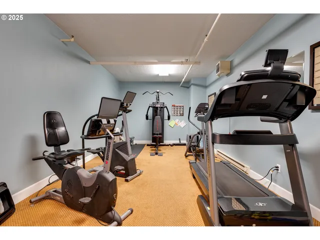 a view of parking garage with cars