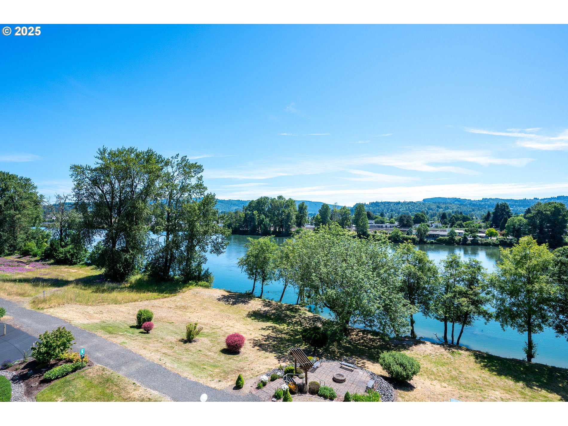 1548 River Road, Unit 401 Longview, WA 98632 - Photo 33 of 34 a view of a lake with a yard