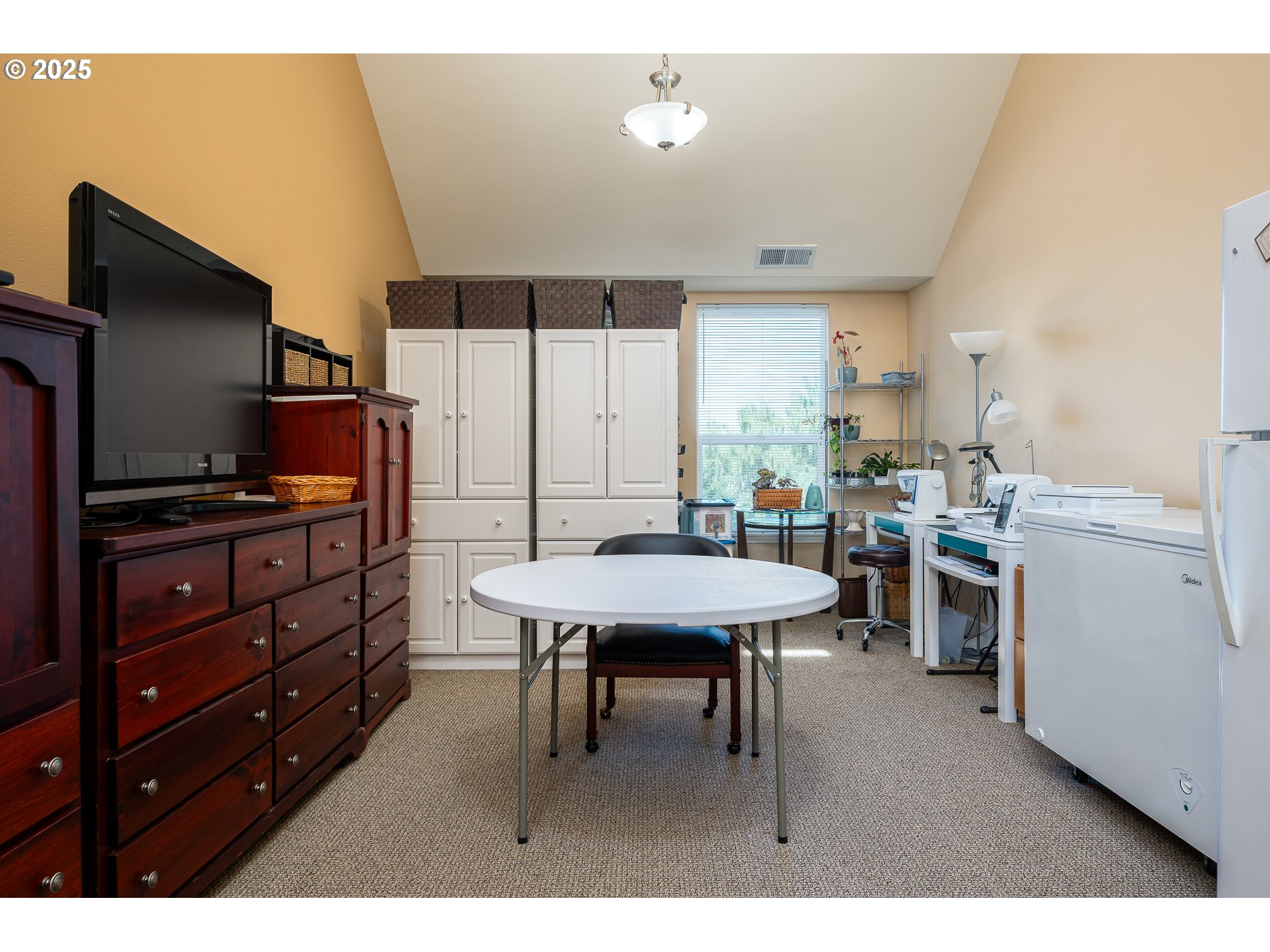 1548 River Road, Unit 401 Longview, WA 98632 - Photo 5 of 34 a open kitchen with a refrigerator and a stove top oven