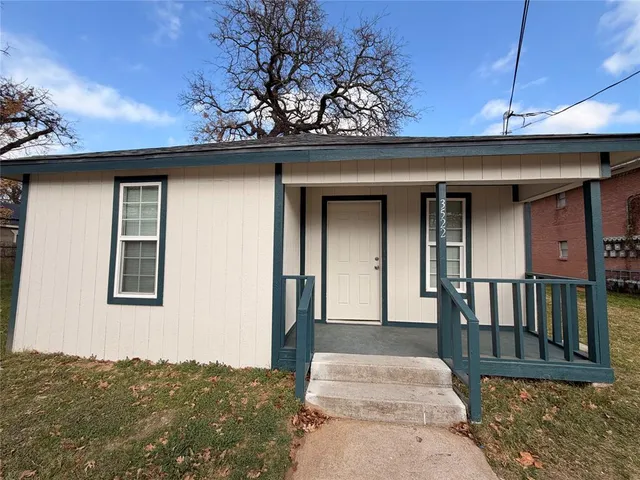 a view of a porch of a house