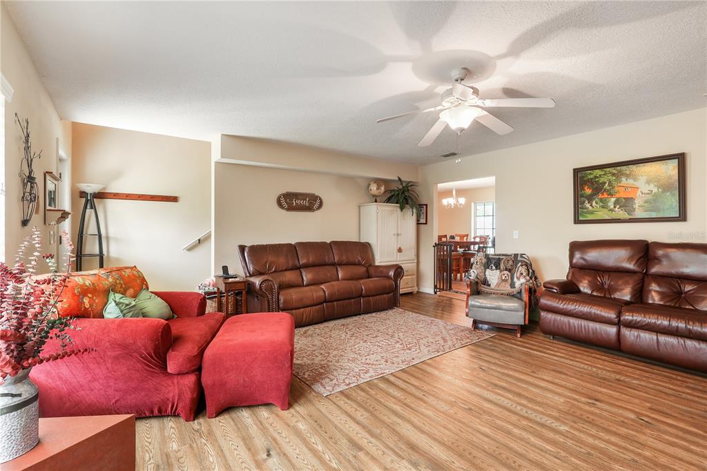 7290 Northeast 106 Terrace Bronson, FL 32621 - Photo 18 of 40 a living room with furniture