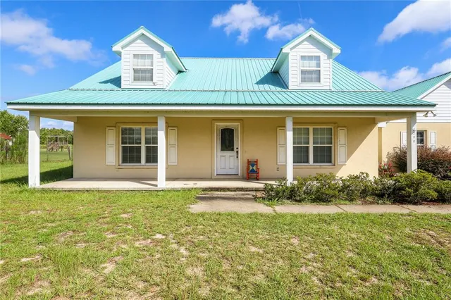 front view of a house with a small yard