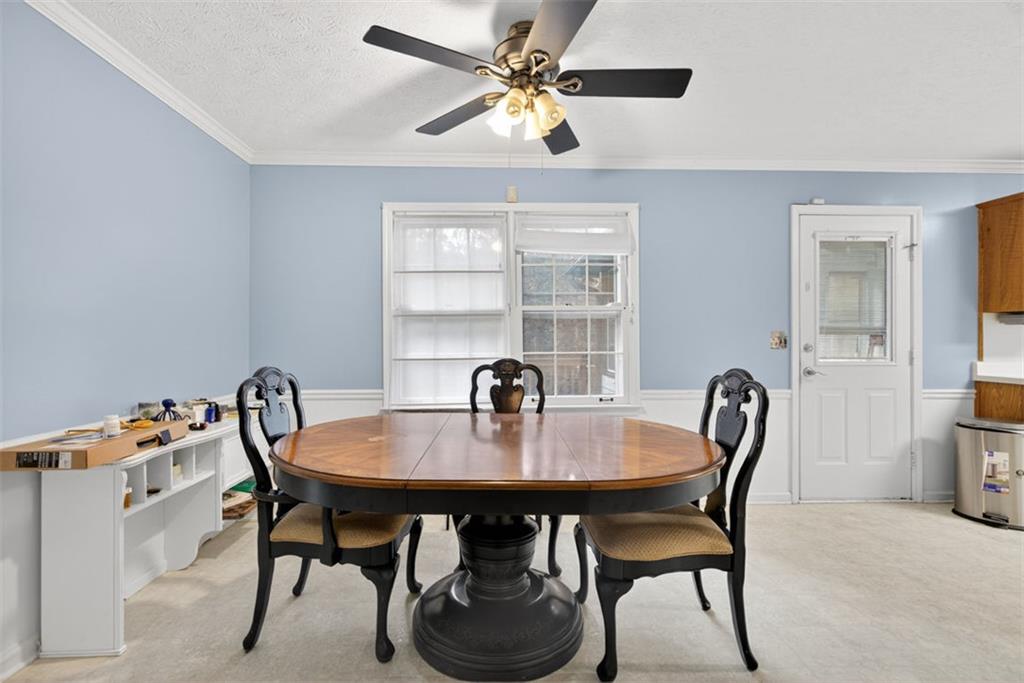 2222 Amber Creek Trail Buford, GA 30519 - Photo 20 of 51 a dining room with furniture and window
