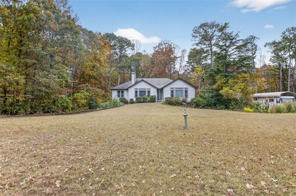 2222 Amber Creek Trail Buford, GA 30519 - Photo 2 of 51 a house with trees in front of it