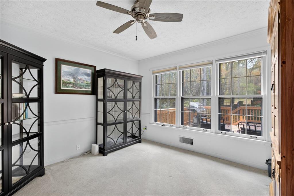 2222 Amber Creek Trail Buford, GA 30519 - Photo 26 of 51 a view of an empty room with windows