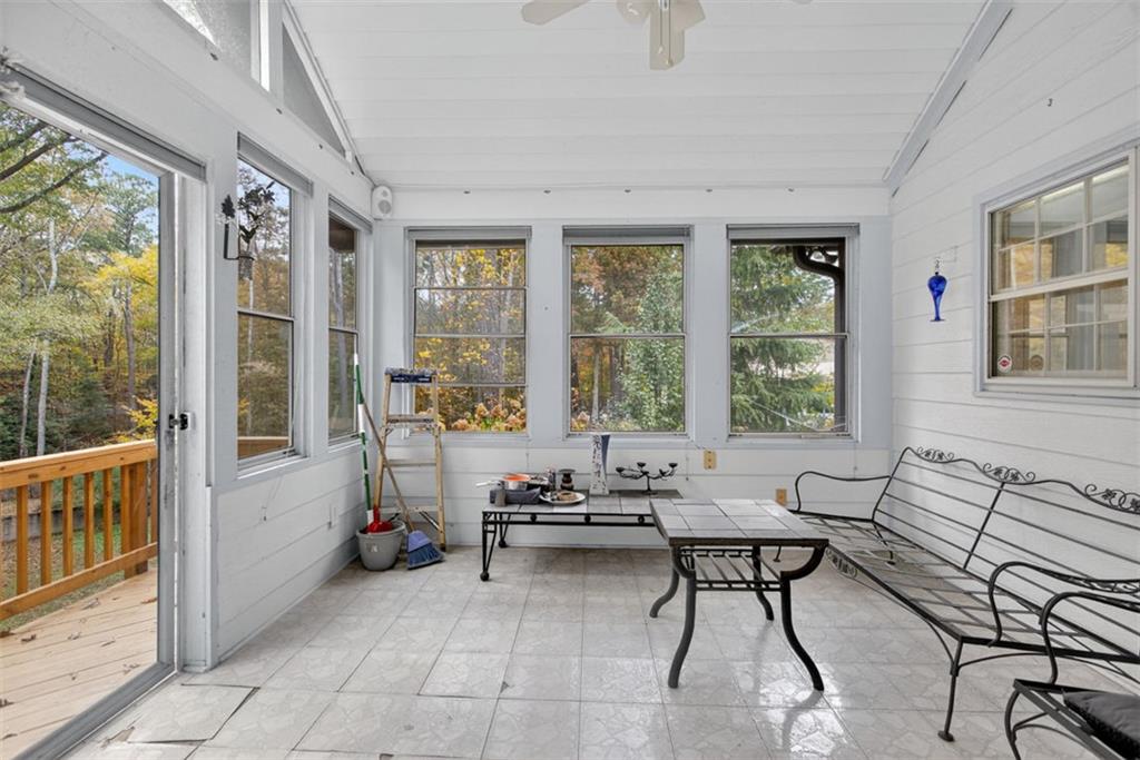2222 Amber Creek Trail Buford, GA 30519 - Photo 35 of 51 a living room with furniture and a large window