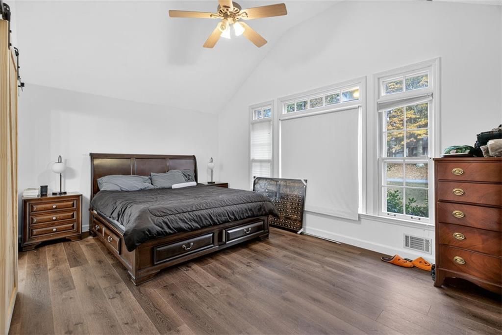 2222 Amber Creek Trail Buford, GA 30519 - Photo 10 of 51 a bedroom with a bed and a window