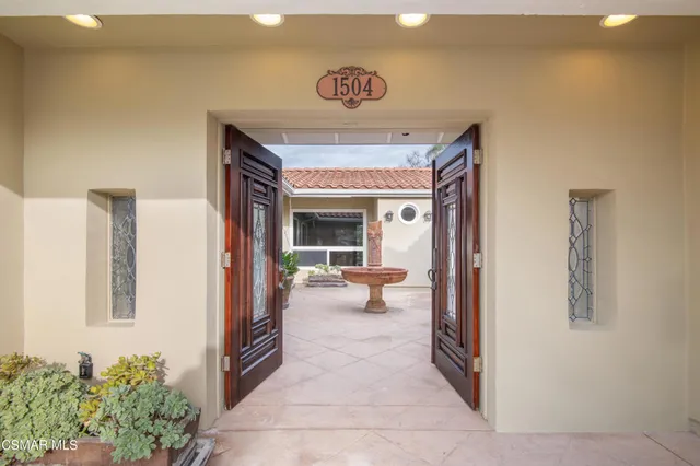 a view of a hallway with entryway