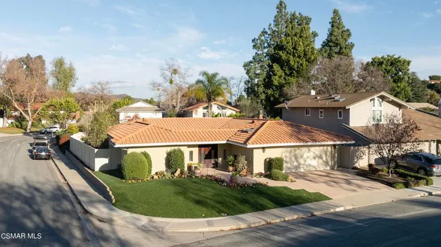 a view of a house with a swimming pool