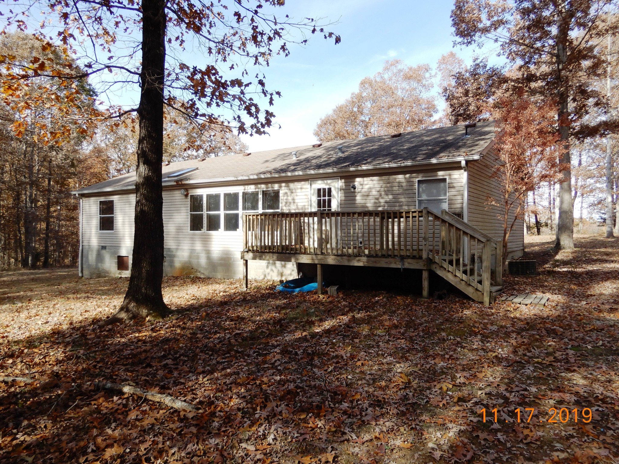 10408 Wilder Point Road Bon Aqua, TN 37025 - Photo 2 of 27 a view of a house with a yard