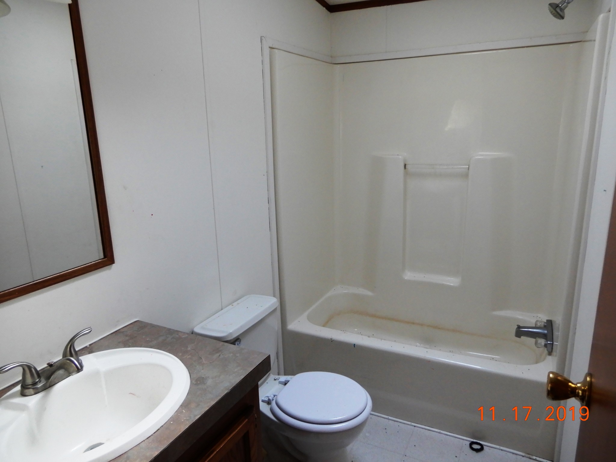10408 Wilder Point Road Bon Aqua, TN 37025 - Photo 14 of 27 a bathroom with a sink toilet and a bathtub