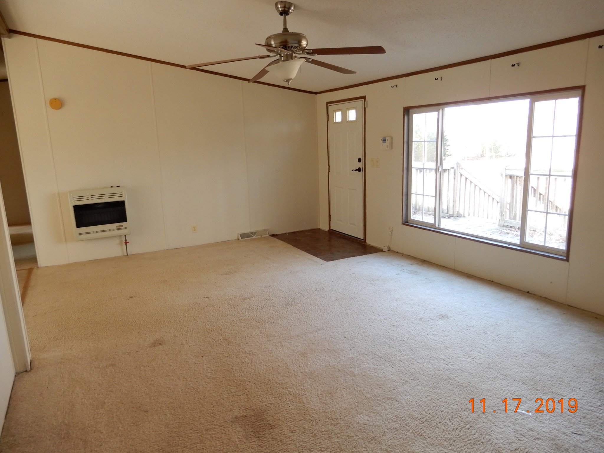 10408 Wilder Point Road Bon Aqua, TN 37025 - Photo 3 of 27 a view of an empty room with a window
