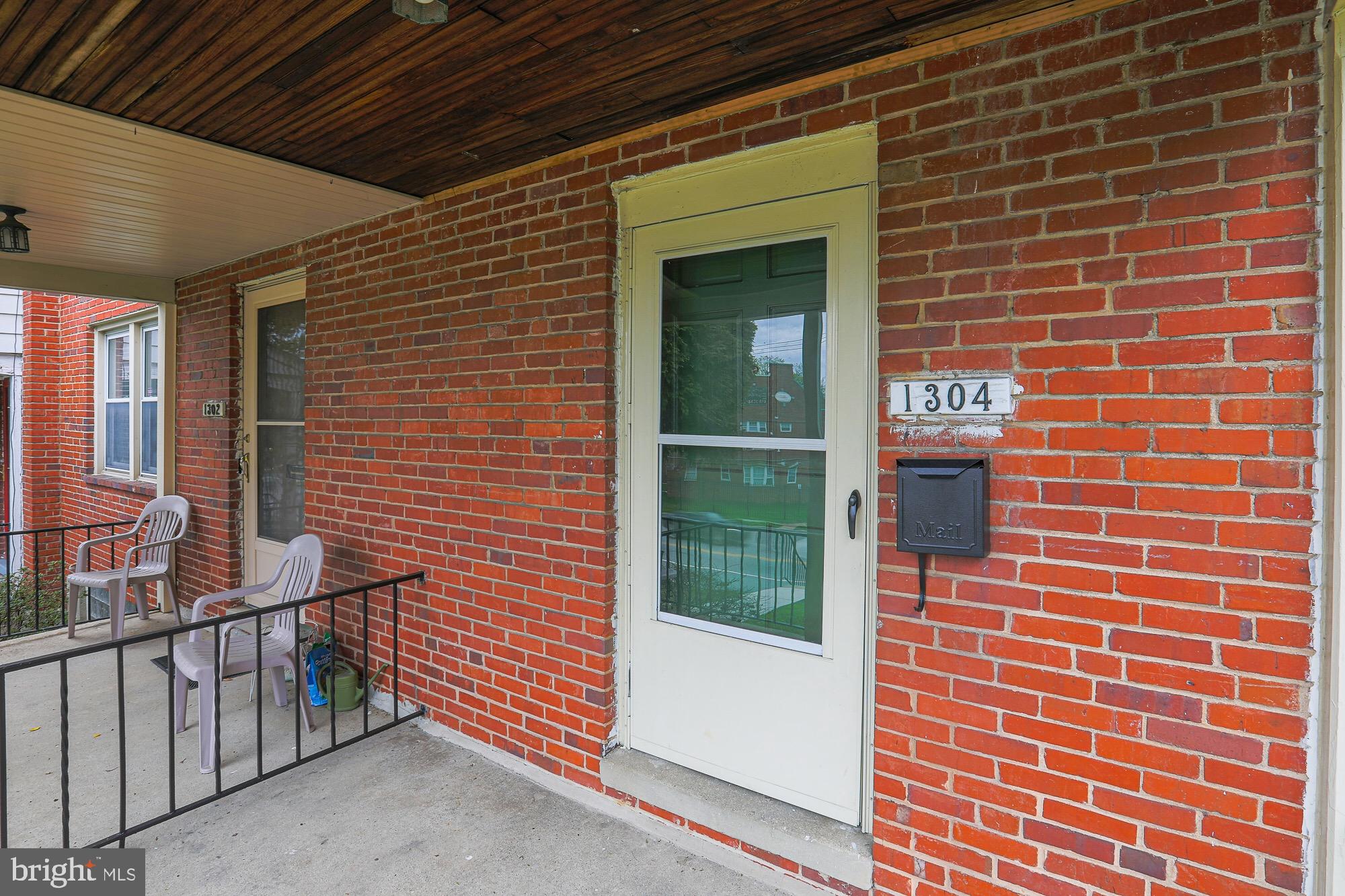 1304 East Cold Spring Lane Baltimore, MD 21239 - Photo 2 of 27 COVERED FRONT PORCH
