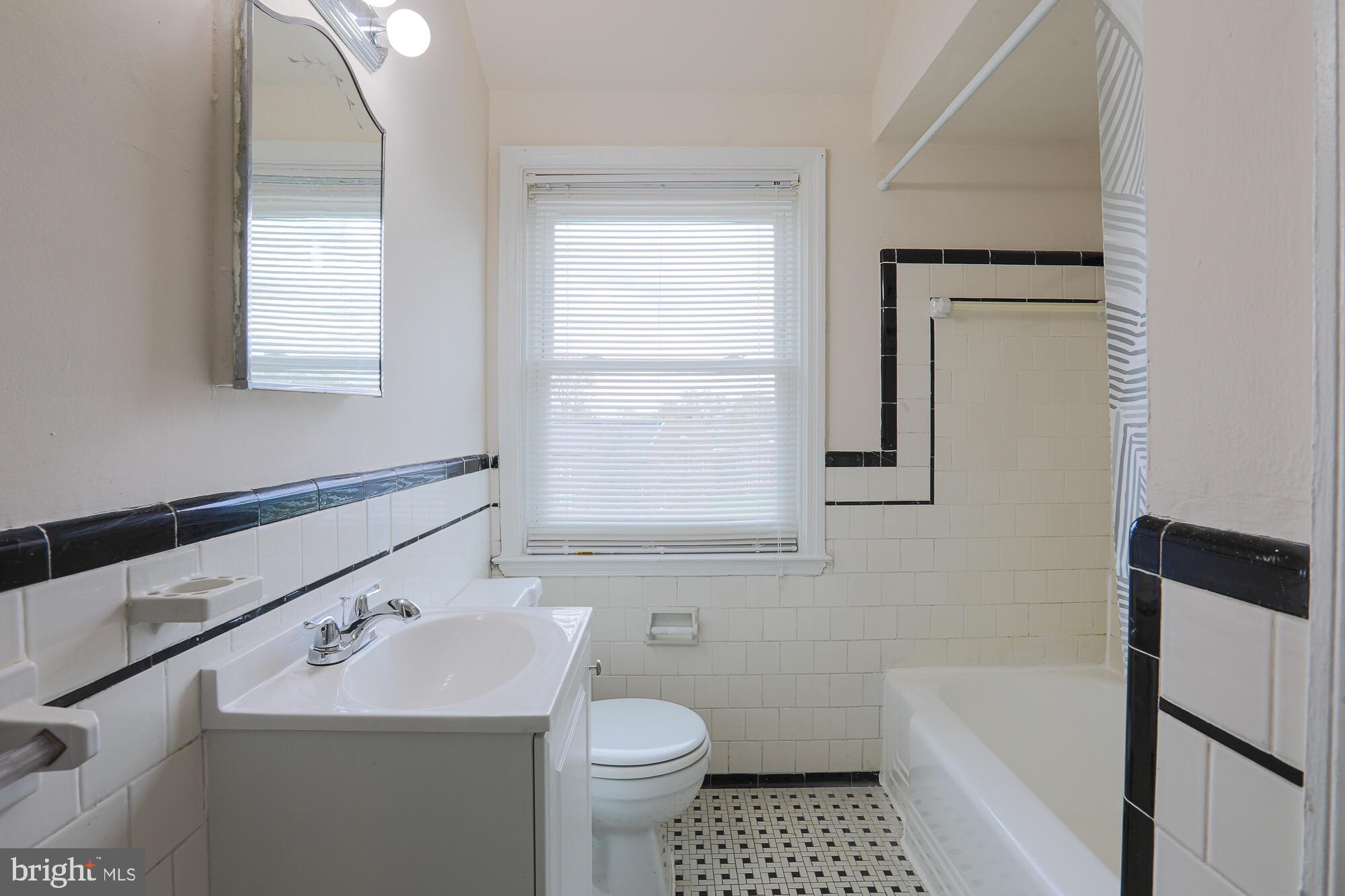 1304 East Cold Spring Lane Baltimore, MD 21239 - Photo 16 of 27 UPPER LEVEL BATHROOM