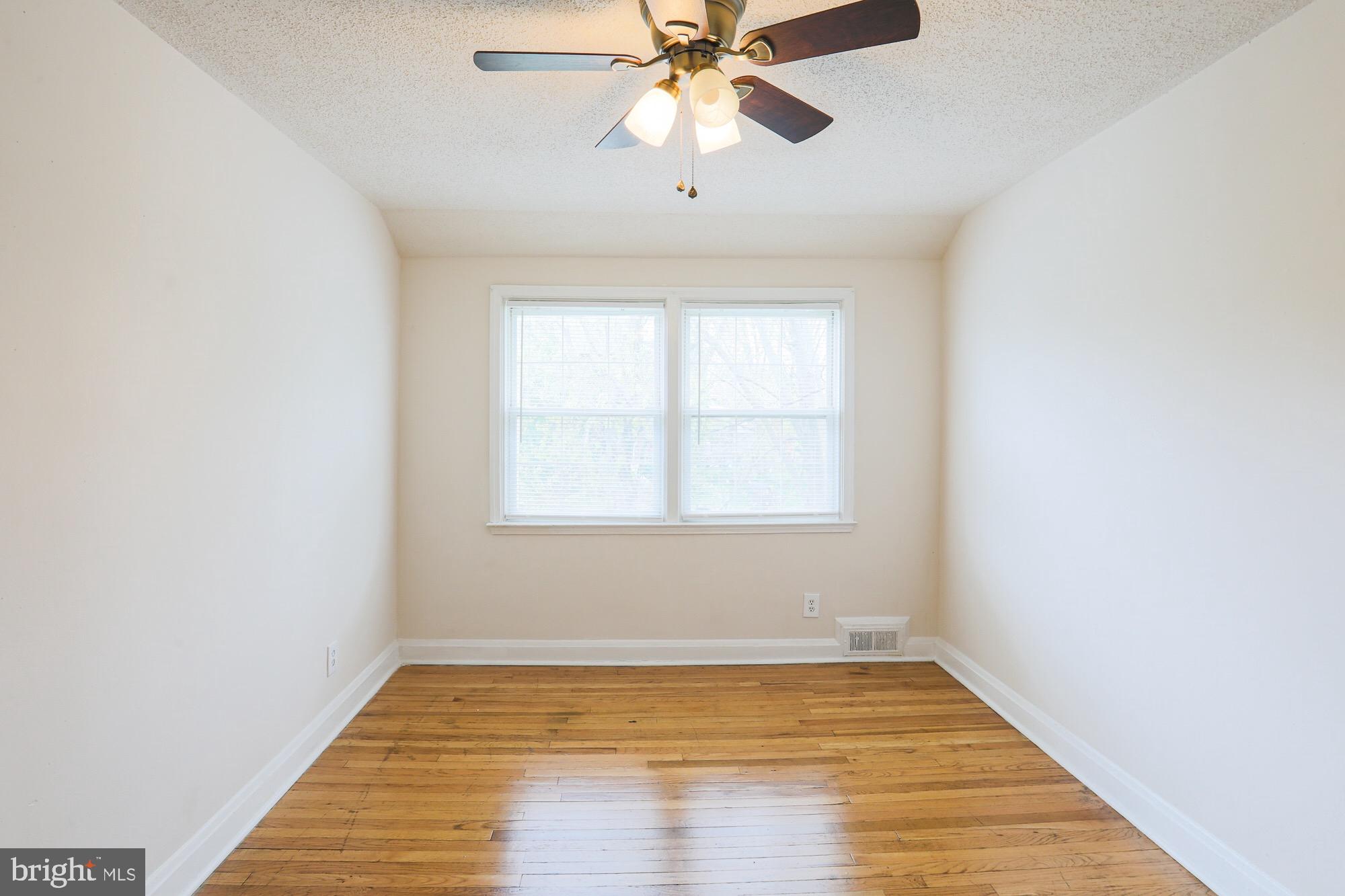1304 East Cold Spring Lane Baltimore, MD 21239 - Photo 21 of 27 NATURAL LIGHT AND ORIGINAL FLOORING