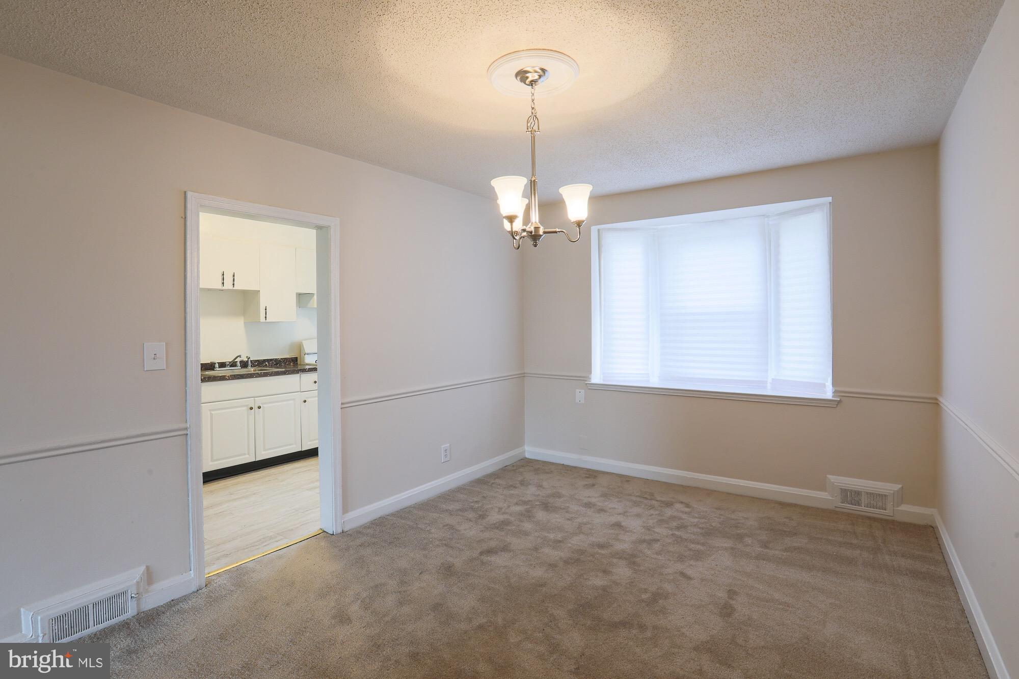 1304 East Cold Spring Lane Baltimore, MD 21239 - Photo 6 of 27 FORMAL DINING ROOM