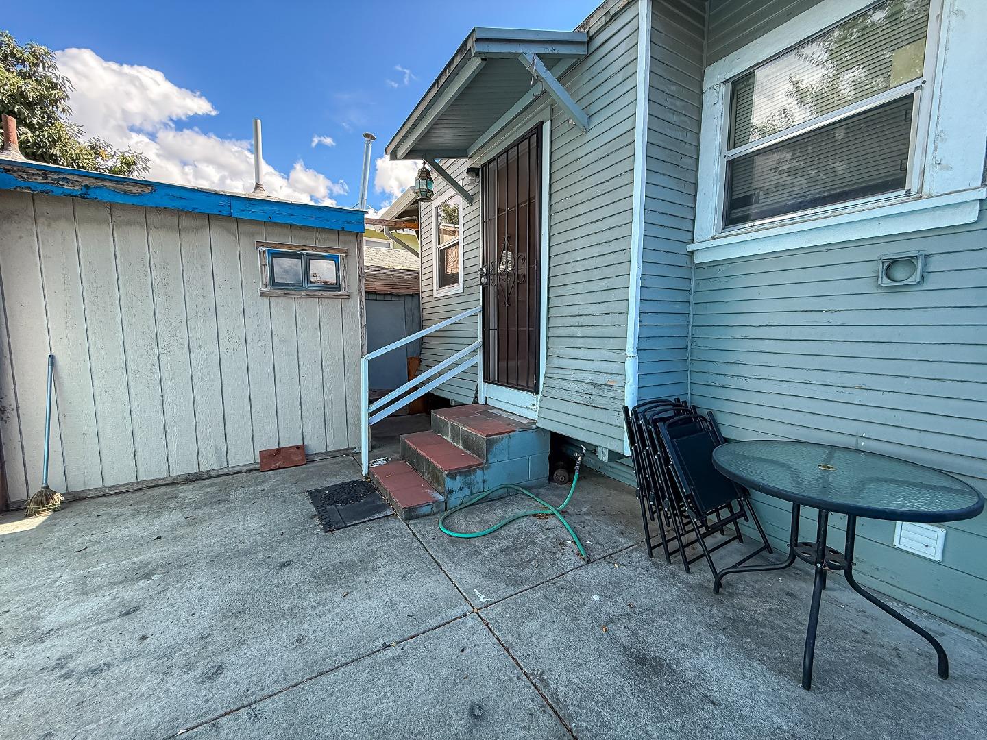 558 A Street Hayward, CA 94541 - Photo 17 of 37 a backyard of a house with chairs