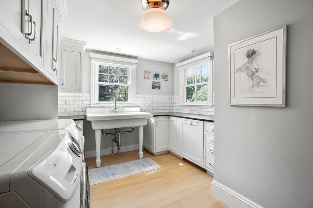 12 Swarthmore Road Wellesley, MA 02482 - Photo 11 of 38 a kitchen with a sink cabinets and window