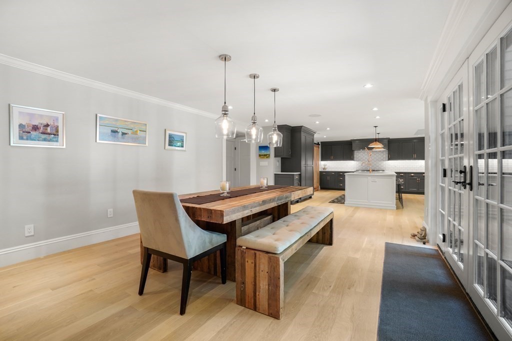 12 Swarthmore Road Wellesley, MA 02482 - Photo 16 of 38 a view of a kitchen with a table and chairs