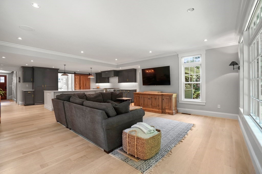 12 Swarthmore Road Wellesley, MA 02482 - Photo 18 of 38 a living room with furniture and a flat screen tv