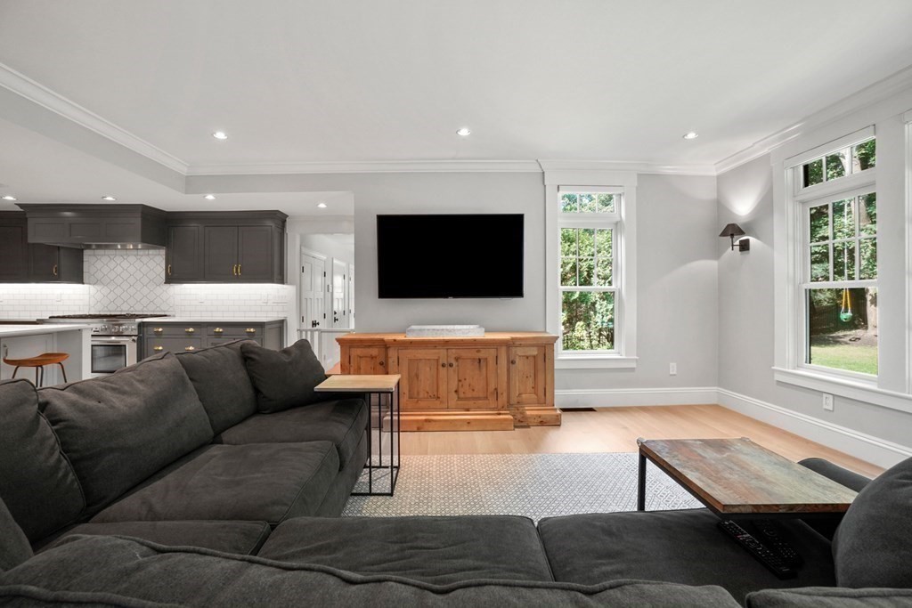 12 Swarthmore Road Wellesley, MA 02482 - Photo 19 of 38 a living room with furniture and a flat screen tv