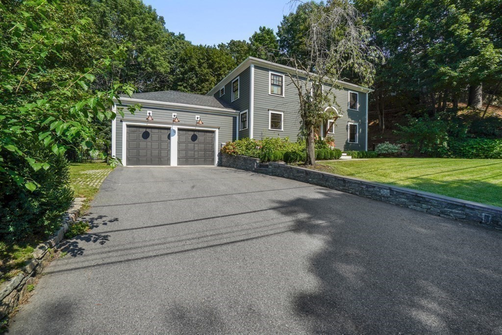 12 Swarthmore Road Wellesley, MA 02482 - Photo 2 of 38 a front view of house with yard and trees