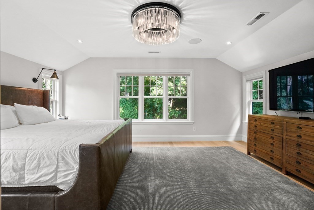 12 Swarthmore Road Wellesley, MA 02482 - Photo 25 of 38 a spacious bedroom with a bed and a dresser