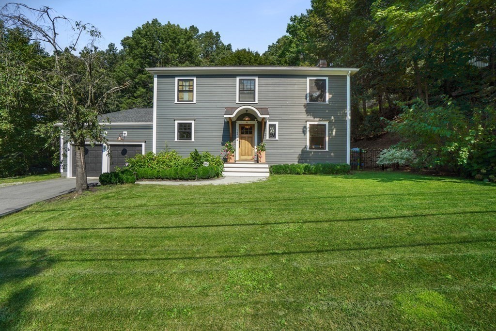 12 Swarthmore Road Wellesley, MA 02482 - Photo 3 of 38 a front view of a house with a yard